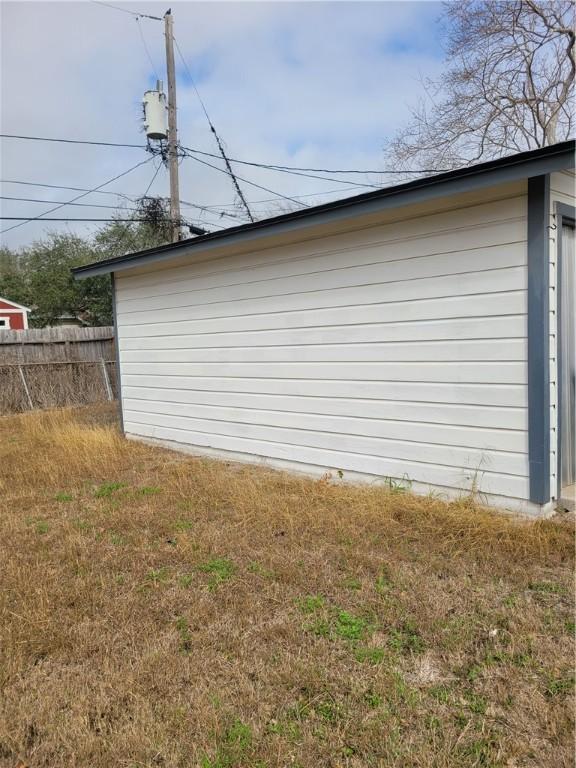 view of home's exterior featuring a yard