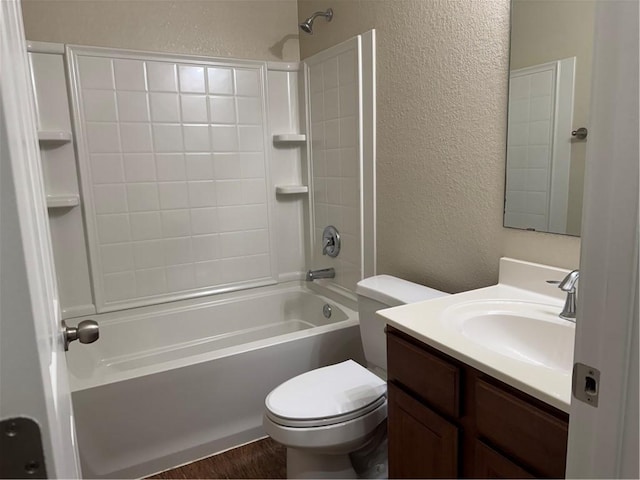 full bathroom with toilet, shower / washtub combination, wood-type flooring, and vanity