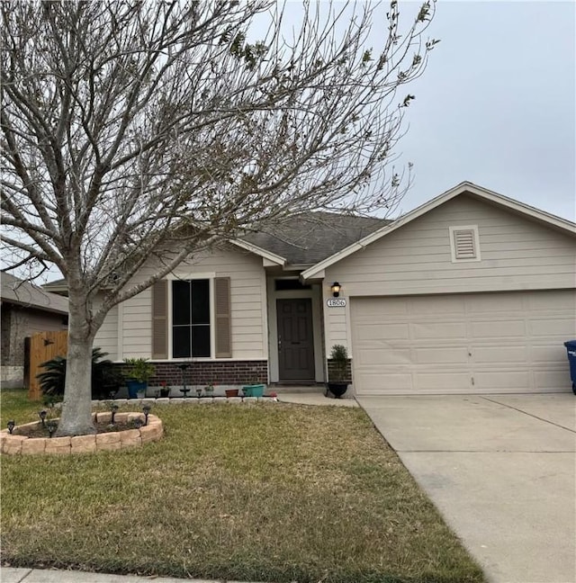 single story home with a garage and a front lawn