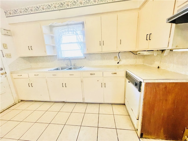 kitchen featuring ventilation hood, sink, white dishwasher, and white cabinets