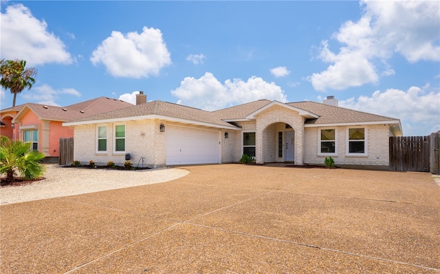 15822 Portillo Dr, Corpus Christi, TX 78418 - ranch-style house featuring a chimney, concrete driveway, and brick siding