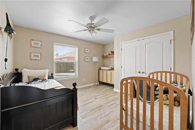 15822 Portillo Dr, Corpus Christi, TX 78418 - bedroom featuring light wood-style floors, a closet, and a ceiling fan