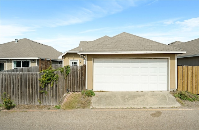 ranch-style home with a garage