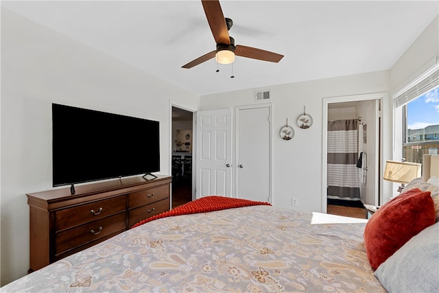 bedroom with ceiling fan and ensuite bathroom