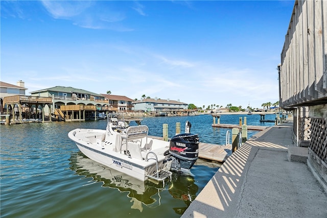 dock area with a water view