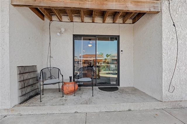 doorway to property featuring a patio area