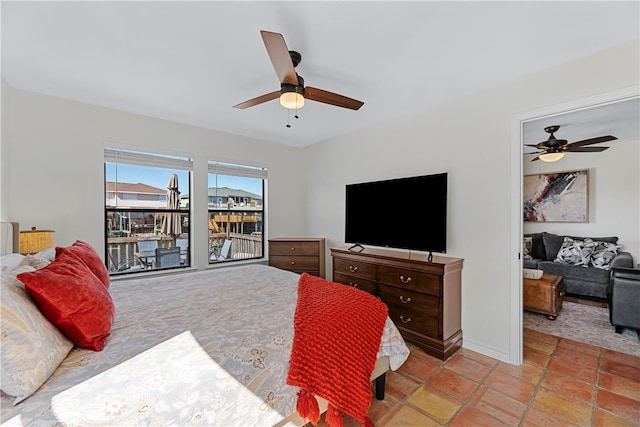 bedroom featuring access to outside and ceiling fan