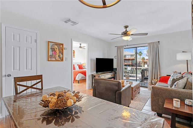 living room with ceiling fan