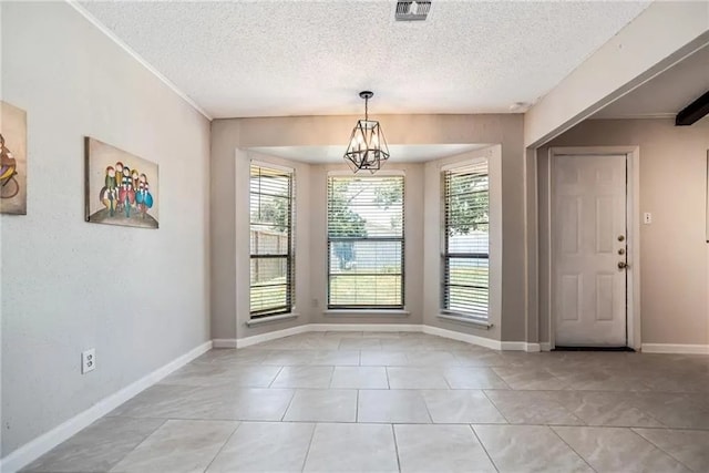 5306 Crestwick Dr, Corpus Christi, TX 78413 - unfurnished dining area with a textured ceiling and light tile patterned flooring