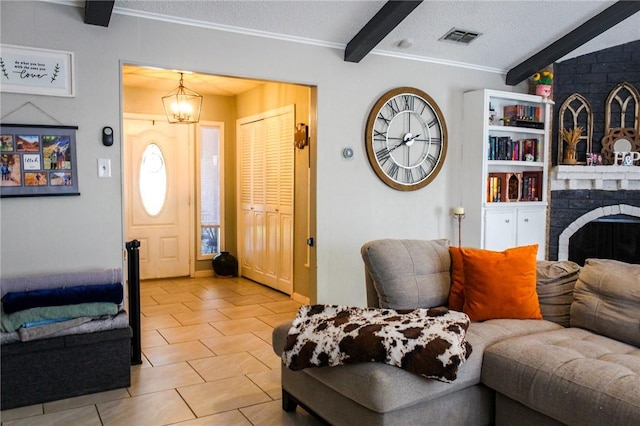 5306 Crestwick Dr, Corpus Christi, TX 78413 - living area featuring beamed ceiling, light tile patterned floors, a fireplace, a chandelier, and ornamental molding