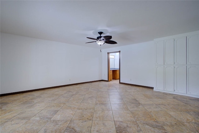 empty room featuring ceiling fan