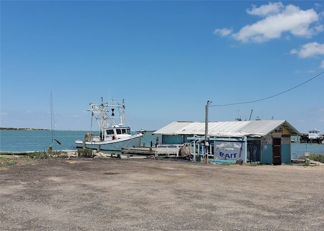 dock area with a water view