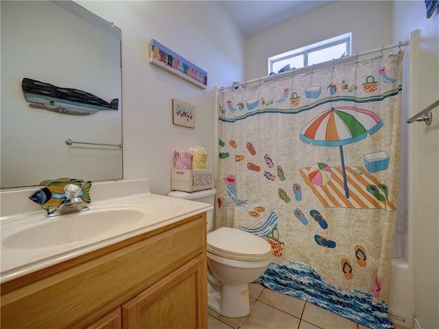 bathroom featuring toilet, vanity, tile patterned floors, and a shower with shower curtain