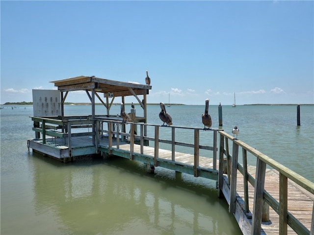 dock area featuring a water view