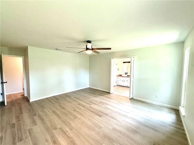 4126 Crenshaw Dr, Corpus Christi, TX 78413 - empty room featuring a ceiling fan and light wood-style flooring