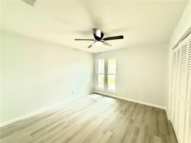 4126 Crenshaw Dr, Corpus Christi, TX 78413 - unfurnished bedroom featuring light wood-style floors, a closet, and ceiling fan
