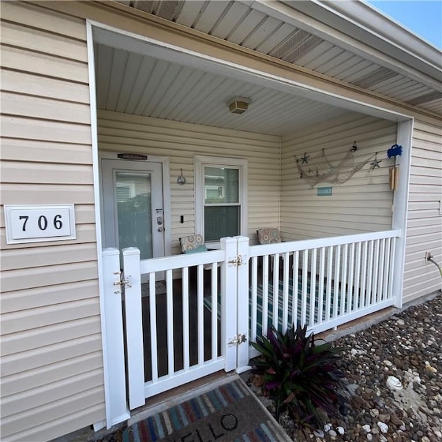 property entrance with a porch