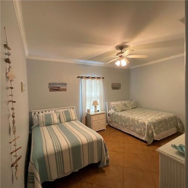 bedroom with ceiling fan, light tile patterned floors, and crown molding