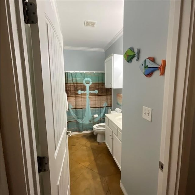 bathroom featuring ornamental molding, tile patterned floors, toilet, vanity, and a shower with shower curtain