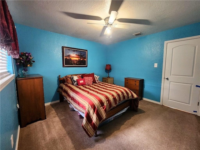2742 Bramblebush Dr, Corpus Christi, TX 78410 - carpeted bedroom featuring a textured ceiling, a textured wall, ceiling fan, and baseboards