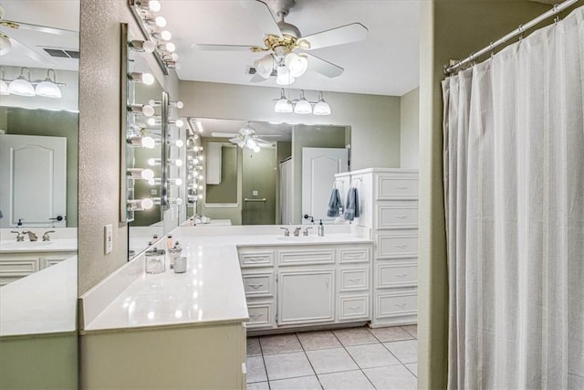 full bathroom with visible vents, ceiling fan, vanity, and tile patterned floors