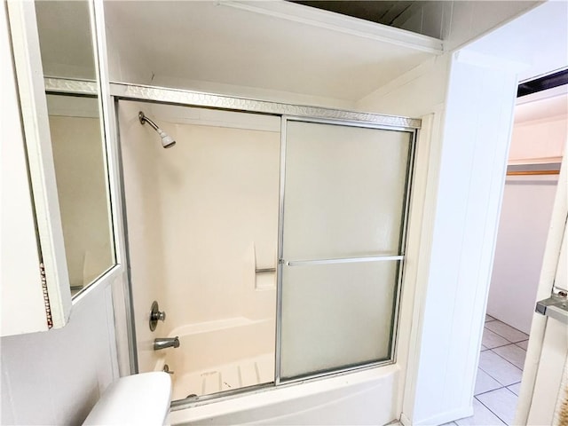 14300 S Padre Island Dr Unit 184, Corpus Christi, TX 78418 - full bath with bath / shower combo with glass door, toilet, and tile patterned flooring