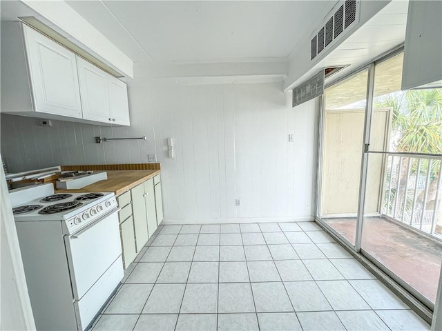 14300 S Padre Island Dr Unit 184, Corpus Christi, TX 78418 - kitchen with plenty of natural light, white range with electric stovetop, visible vents, and white cabinets