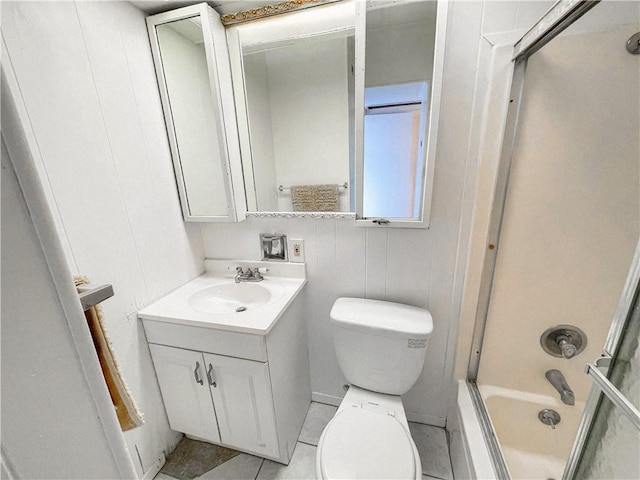 14300 S Padre Island Dr Unit 184, Corpus Christi, TX 78418 - full bath with toilet, shower / bath combination with glass door, tile patterned floors, and vanity