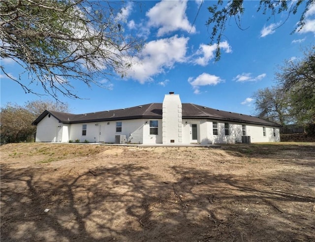 back of property featuring cooling unit