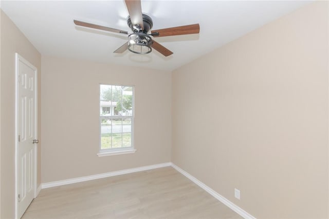 unfurnished room with ceiling fan and light hardwood / wood-style floors