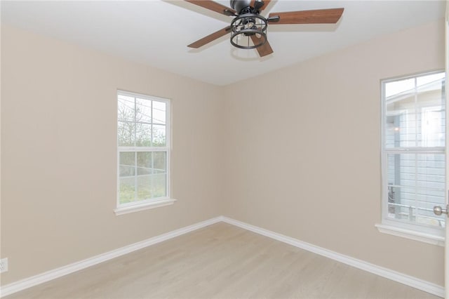 unfurnished room with ceiling fan and light hardwood / wood-style flooring