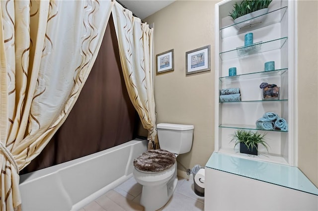 full bathroom featuring shower / bath combination with curtain, toilet, and tile patterned floors