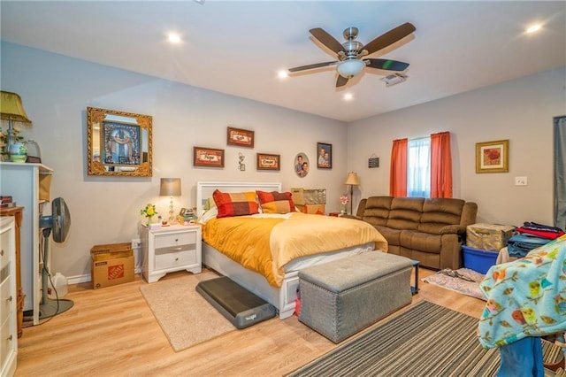 bedroom featuring ceiling fan and light wood-type flooring