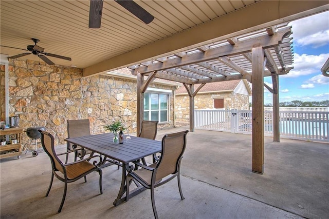 view of patio featuring ceiling fan and a pergola