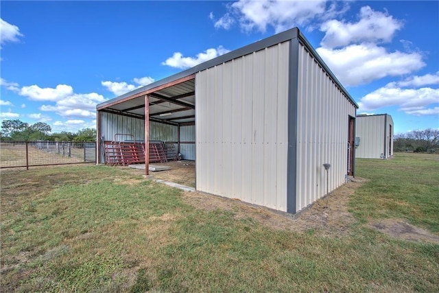 view of outdoor structure featuring a yard