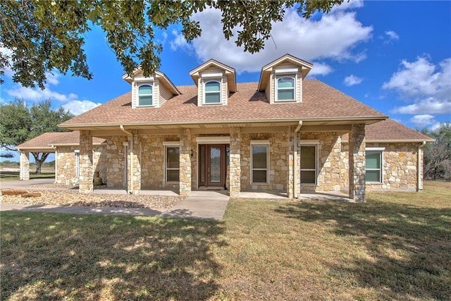 view of front of home with a front yard