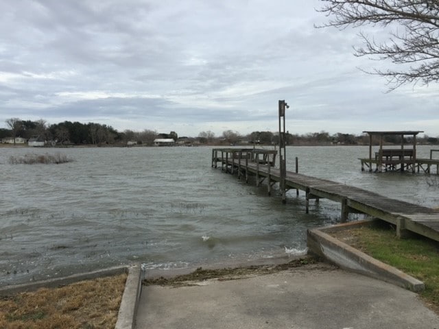 dock area featuring a water view