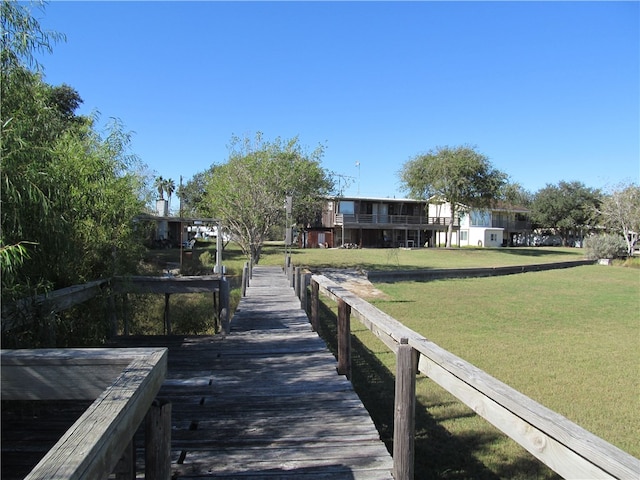 dock area with a lawn