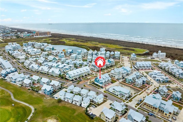 aerial view featuring a beach view and a water view