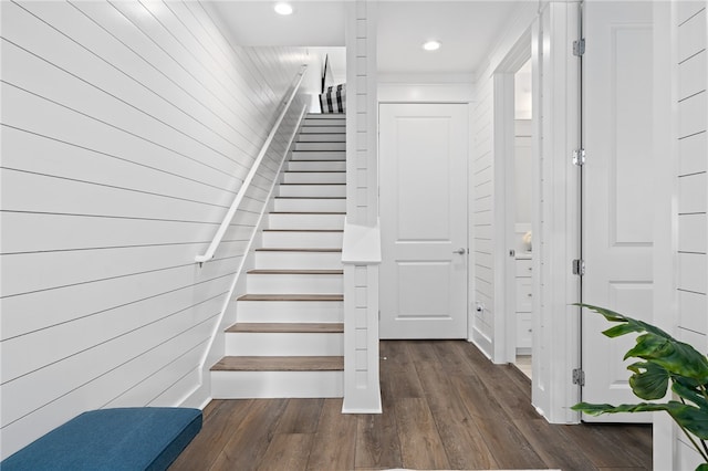 stairway with wood-type flooring