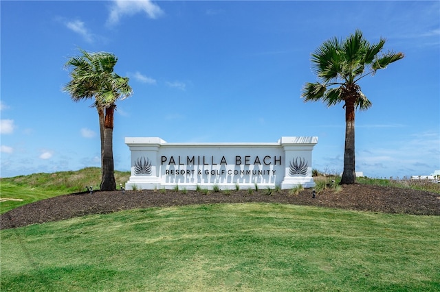 community sign with a lawn