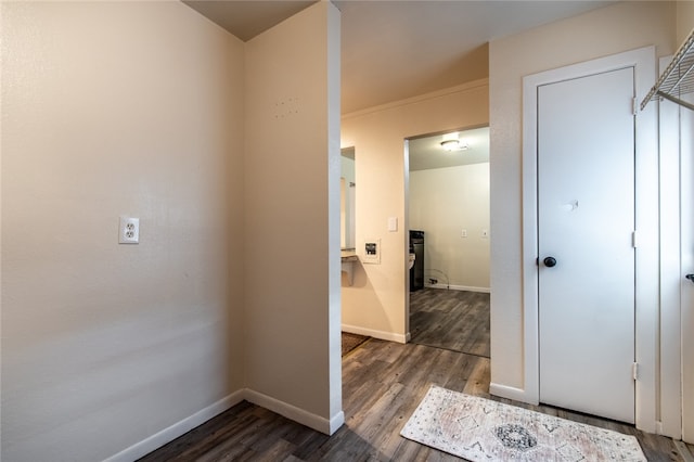 hall with dark hardwood / wood-style floors