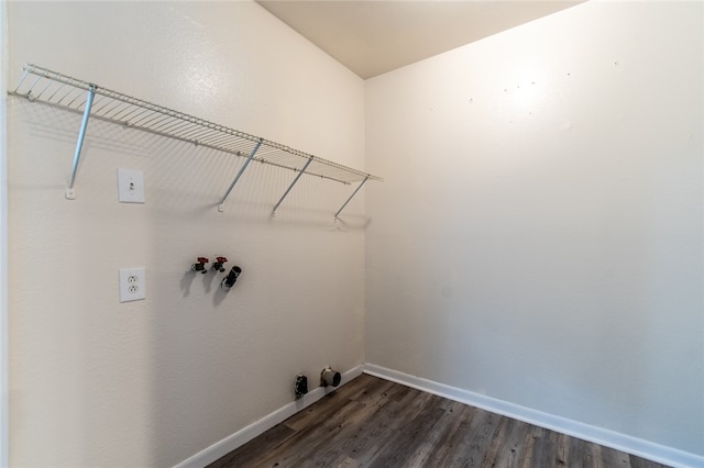 laundry area with washer hookup and dark hardwood / wood-style floors