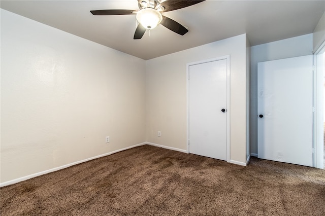 unfurnished bedroom with carpet and ceiling fan