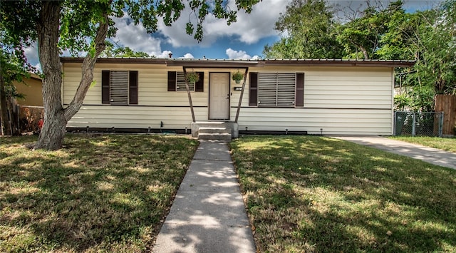 view of front of home with a front lawn