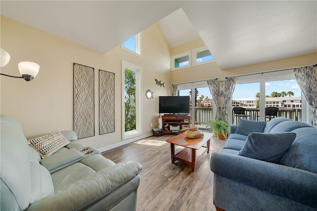 14300 Aloha St Unit 134, Corpus Christi, TX 78418 - living room with wood finished floors and high vaulted ceiling