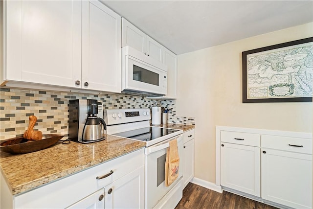 14300 Aloha St Unit 134, Corpus Christi, TX 78418 - kitchen with white appliances, light stone counters, decorative backsplash, white cabinetry, and dark wood-type flooring