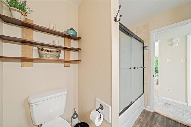 14300 Aloha St Unit 134, Corpus Christi, TX 78418 - full bathroom with wood finished floors and combined bath / shower with glass door
