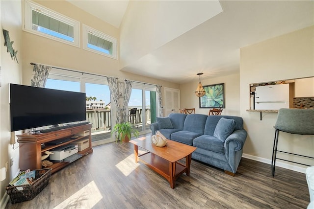 14300 Aloha St Unit 134, Corpus Christi, TX 78418 - living room featuring wood finished floors and a towering ceiling