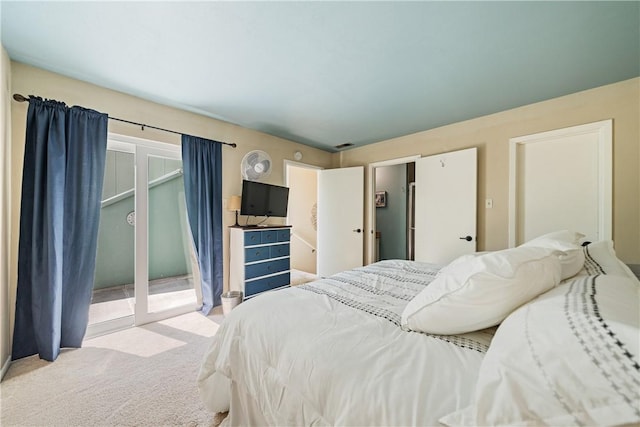14300 Aloha St Unit 134, Corpus Christi, TX 78418 - bedroom featuring access to exterior and light colored carpet